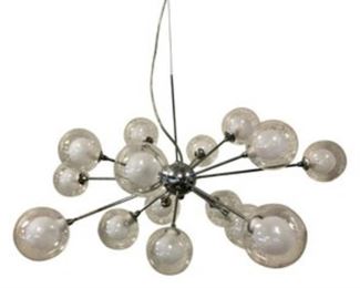 Nuevo Yves Pendant The Yves pendant lamp features a chrome canopy and fixture, a 98-inch-long cable, clear glass exterior shades, frosted glass interior shades, and 15 included light bulbs.
DIMENSIONS
31.5 x 12 x 31.5 in