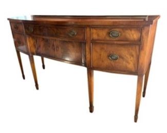 Flame Mahogany Sideboard
A reproduction Mahogany sideboard. Comes with a key.
CONDITION
There is some loss to the wood in several places including the keyhole. Scratches throughout.
DIMENSIONS
68 x 36 x 23 in