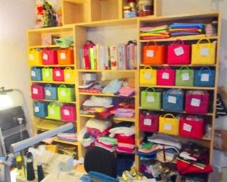 Sewing room for professional seamstress filled with everything  required to make just about anything