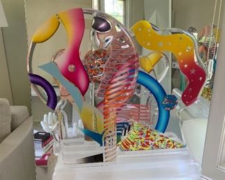 Yankel Ginzburg Acrylic Sculpture "Paradise" Signed and numbered.(numbered 23/45) and entitled "Paradise"
Magnificent movable five piece painted acrylic sculpture by world famous artist Yankel Ginzburg whose work is given by the government to foreign diplomats, collected by true art lovers. This piece has a male profile, a female profile, the lovers, with another piece representing Paradise, and the fourth the World. Moving the 4 pieces around in the slots in the base, changing their positions, is such a joy, giving deep meaning to the love of the two in Paradise.