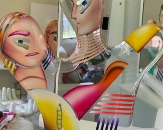 Yankel Ginzburg Acrylic Sculpture "Paradise" Signed and numbered.(numbered 23/45) and entitled "Paradise"
Magnificent movable five piece painted acrylic sculpture by world famous artist Yankel Ginzburg whose work is given by the government to foreign diplomats, collected by true art lovers. This piece has a male profile, a female profile, the lovers, with another piece representing Paradise, and the fourth the World. Moving the 4 pieces around in the slots in the base, changing their positions, is such a joy, giving deep meaning to the love of the two in Paradise.