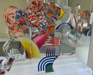 Yankel Ginzburg Acrylic Sculpture "Paradise" Signed and numbered.(numbered 23/45) and entitled "Paradise"
Magnificent movable five piece painted acrylic sculpture by world famous artist Yankel Ginzburg whose work is given by the government to foreign diplomats, collected by true art lovers. This piece has a male profile, a female profile, the lovers, with another piece representing Paradise, and the fourth the World. Moving the 4 pieces around in the slots in the base, changing their positions, is such a joy, giving deep meaning to the love of the two in Paradise.