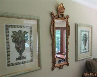 prints and gold mirror