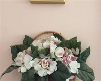 Hanging basket and artwork.