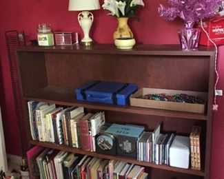 Bookshelf with books.