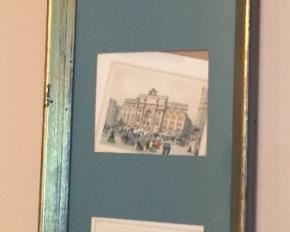 Framed postcards.