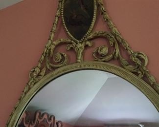 Gilded mirror.
