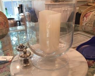 Glass globe with candle.