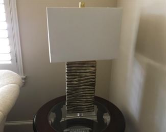 Item:  Pair of contemporary silver table lamps 
Condition:   Excellent
Description:  Made of plastic with metal base

Price: $100 price for pair
