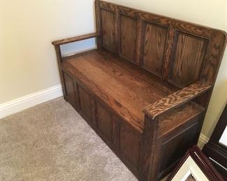 Item:   Antique Tiger Oak Storage Bench
Condition:   Good Used
Measurements: 48w x 18d x 36h
Description:  Tiger Oak Storage Bench with solid back, arms and lift up top

Price: $350
