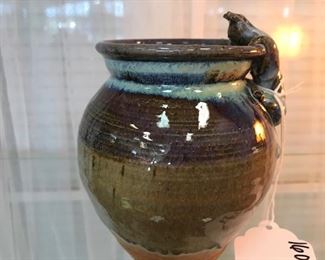 Kitty Cat looking over signed Pottery Vase