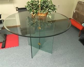 . . . a unique glass table with faux ivy