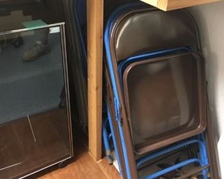 . . . about a dozen folding chair