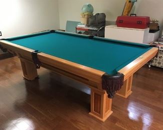 . . . this is a Schmidt pool table that the owner says was only racked on about 50 times total -- beautiful piece