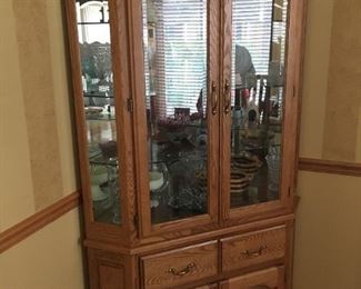 . . . a beautiful oak corner cabinet