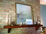 Beautiful Gold Framed Beveled Glass Mirror. Figurines and Candlesticks.