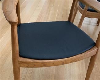 Set of 8 Hans Wegner style dining chairs. MEASUREMENTS: 30"H x 25"W x 21 1/2"D. $1800 for 8 chairs.