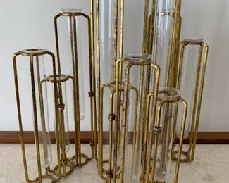 Jointed expandable flower vase group. MEASUREMENTS: 22 1/2" Highest point, expands to 22 1/2" wide. $75