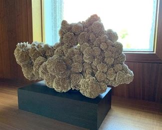 Large Rose Rock specimen on walnut base. MEASUREMENTS: 13"H (including walnut base) x 18"W. $250.