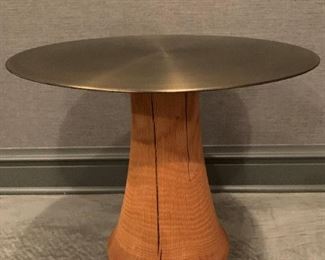 Chinese Brass side table with solid wooden base. MEASUREMENTS: 21 1/2"H x 21 1/2"D. $150