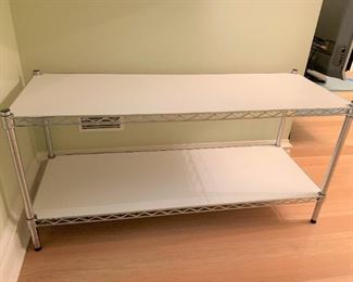 Utility shelving unit. MEASUREMENTS: 23 1/2"H x 47 1/2"L x 18"D. $35