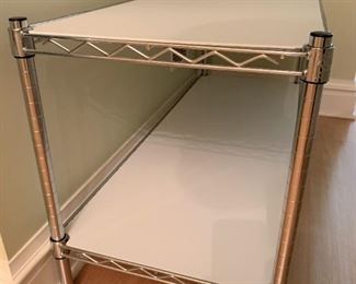 Utility shelving unit. MEASUREMENTS: 23 1/2"H x 47 1/2"L x 18"D. $35