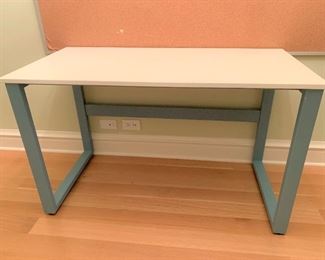 Desk with solid surface top on metal base. MEASUREMENTS: 24"H x 30"L x 20"D. $150