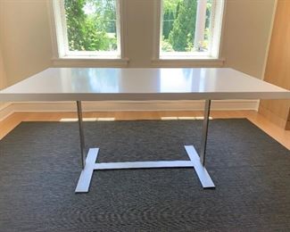 Solid surface table on metal base. MEASUREMENTS: 30"H x 66"L x 36"W. $750
