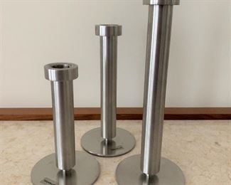Trio of Blumus candlesticks. MEASUREMENTS: Tallest 8 3/4"H. $75