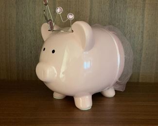 Pink piggy bank. MEASUREMENTS: 8 3/4"H x 10"L. $5
