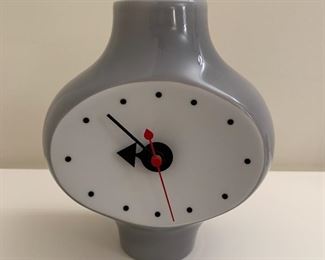 George Nelson Vitra ceramic clock. MEASUREMENTS: 7"H x 6"W x 3 1/2"D. $175