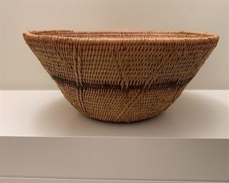 Hand woven basket. MEASUREMENTS: 5"H x 11"D. $35