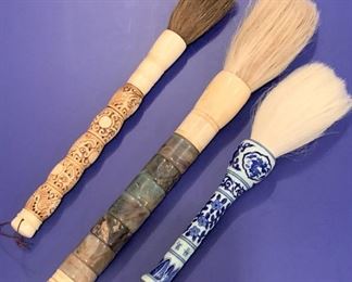 Three large vintage Japanese calligraphy brushes. MEASUREMENTS: Largest 16"Long by 1 1/2"W. All for $300.