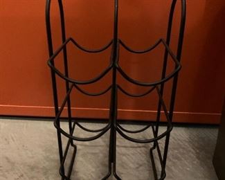 Wine rack. MEASUREMENTS: 14 1/2"H x 7 3/4"W x 6 1/2"D $5