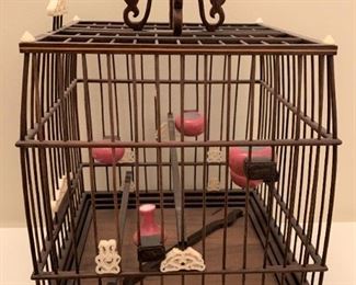 Chinese cricket cage. MEASUREMENTS: 11"H x 7 1/2" x 7 1/2". $50