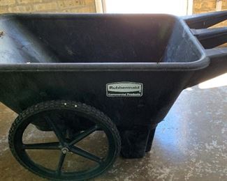 Large Rubbermaid wheel barrow. MEASUREMENTS: 28"H x 57"L x 28"W. Bucket measures 28"W x 44"L x 15"D. $75