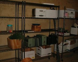 Several commercial rolling metal storage shelving units