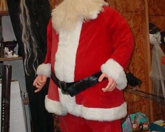 A full size Santa display figure with toy sack