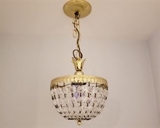 Another small glass and brass hanging lamp