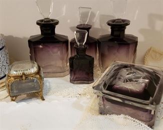 Purple to clear antique glass dresser set