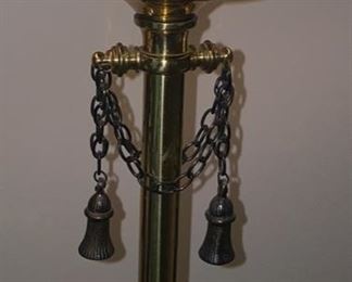 Lot 514 . $225.00  Close-up of the adornments of the lamp.