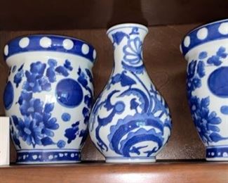 Lot 522  Lot of 3 Vases $18.00  Blue & White.  The middle vase is 8” tall