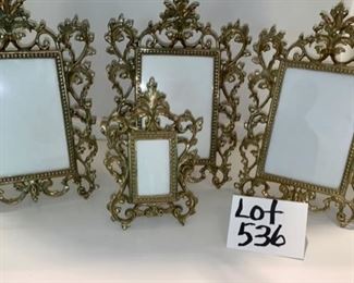 Lot 536.  $80.00  Set of 4 Victorian  Signed and solidly brass frames.  We don’t know much about these except they look dazzling!  Top Row frames are 5x7” and the smallest is 3.5” x 2.  I believe those are measurements for what size photo the frames could accommodate.