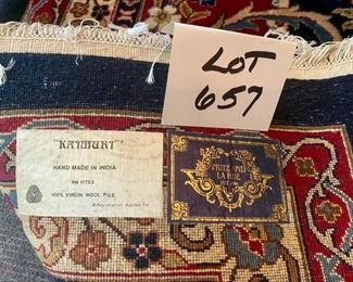 Lot 657  $3975.00   Fritz & LaRue, importers, 100% wool area rug. 13' x 9'2". KATMURI (the Collection)  RN 17723. Made in India, hand-knotted in Navy Blue, Burgundy, medium blue and taupe color palette. Pristine condition.