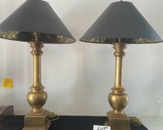 Lot 658. $650.00 for the Pair. 1979 E.F. Chapman Brass lamps with black shades.  36" tall, 6" square brass base.
