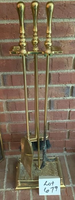 Lot 679. $30.00  3 Brass, fireplace tools, and brass stand.