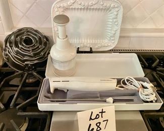 Lot 687. $40.00 Hamilton Beach Carve 'n Set, Rose Cake Pan and Pampered Chef Food Chopper, white bowl with fruit in relief- made in Italy. (Rose cake pan was $28 alone and is new.)