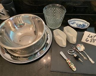 LLot 688.  $25.00  12 pc misc set, slate cheese square, 2 platters, stainless mixing bowl, glass ice bucket, 2 silverware caddy, fork, spoon, spreader, and wine topper, blue and white porcelain tidbit dish