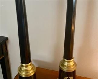 Lot 690.  $50.00. These candlesticks are simply irresistible!  21" tall. Tall dark and handsome (onyx?) candlesticks with brass laurels and adornment.  