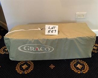 Lot 557. $40.00  Lightly used, Graco Pack n Play, Gray